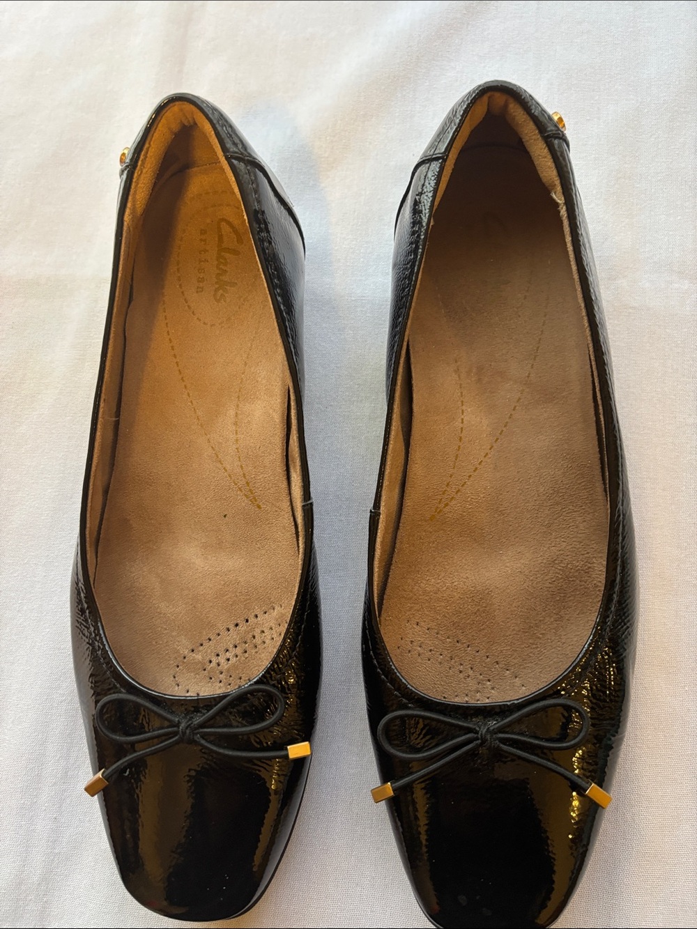 Clarks Black Patent Leather Bow Ballet Flats with Gold Accents